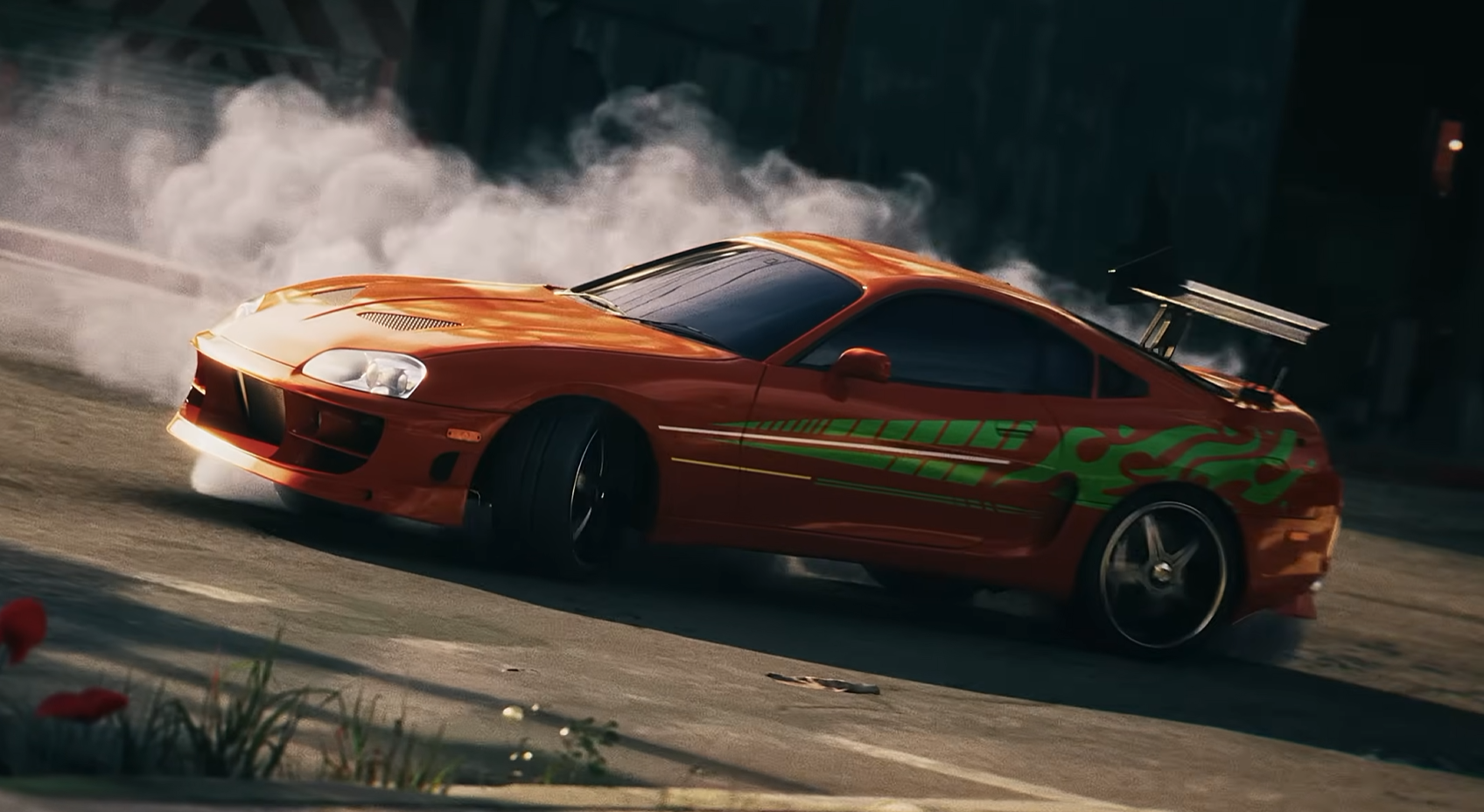 Toyota Supra arancione durante una scena d’azione di Stuntman Hollywood